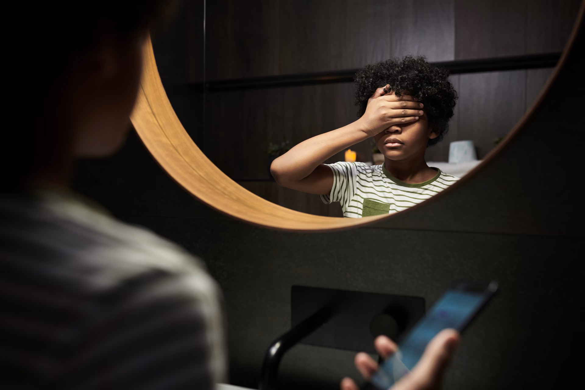 What causes emotional mirroring in autism?
