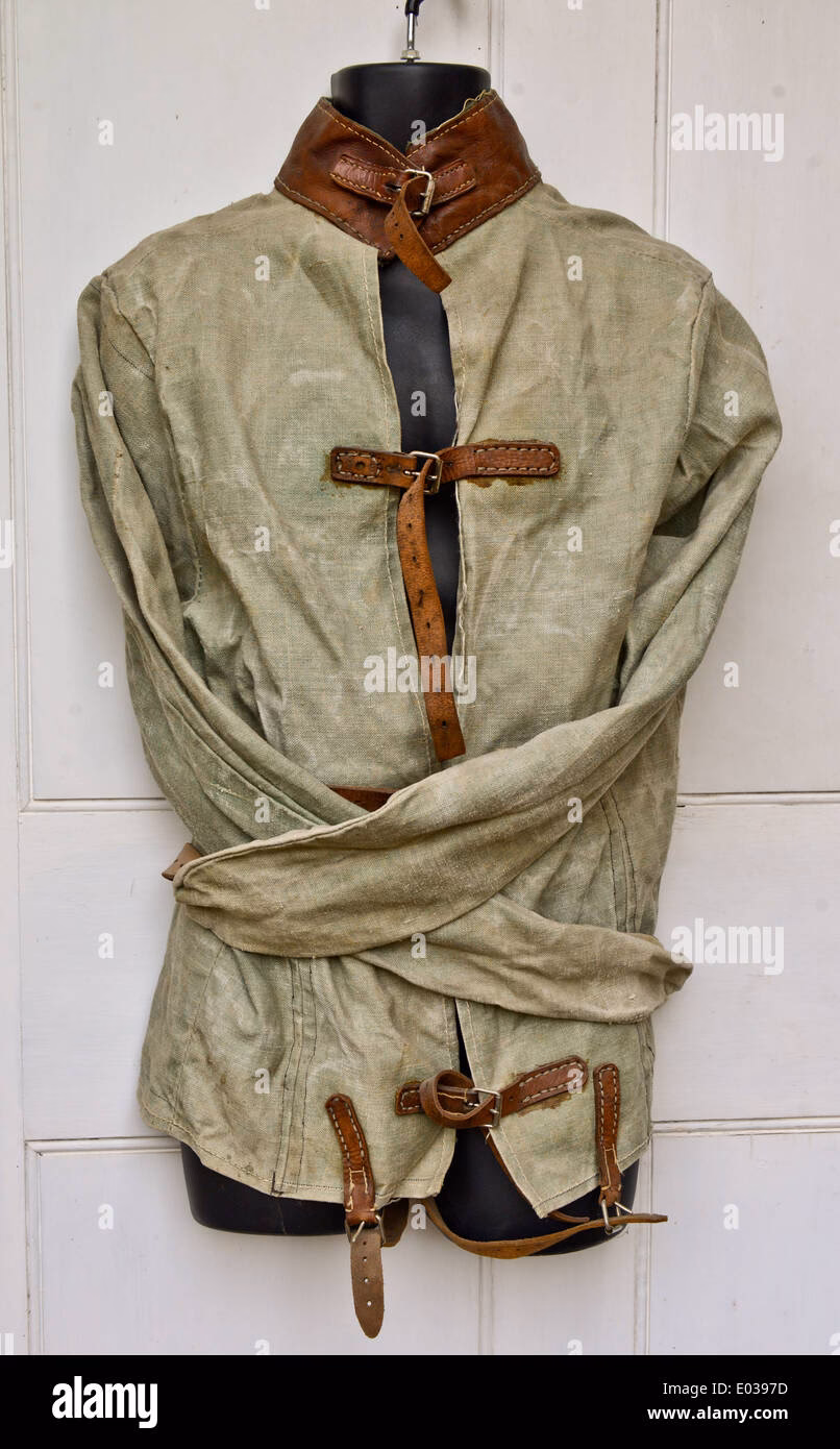 What is a straitjacket used for?
